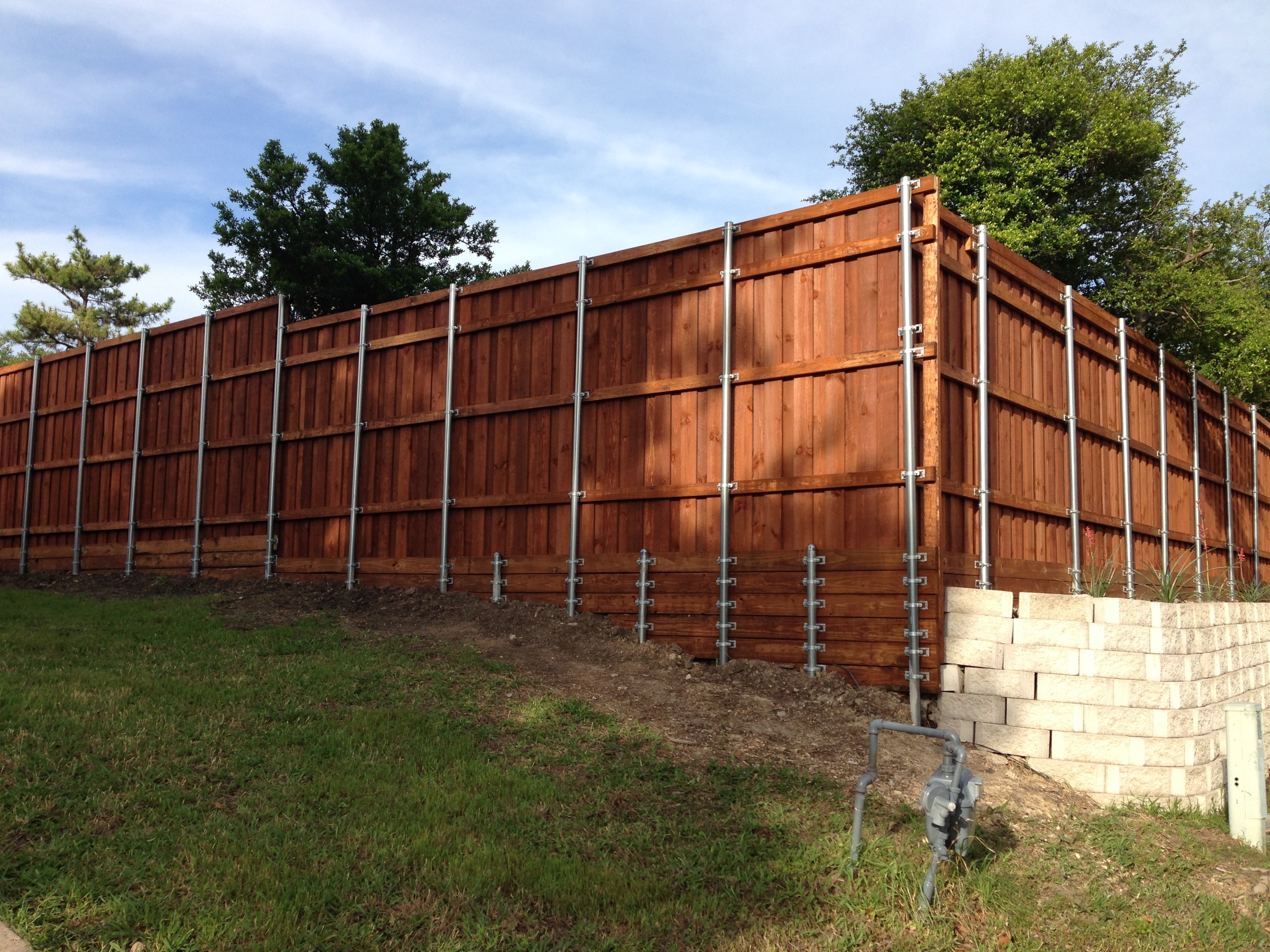 Corner Fence & Retaining Wall — Allen